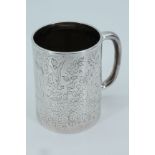 A Victorian silver christening mug, of tapering cylindrical form profusely engraved with bluebells