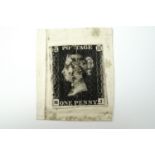 A 1d black postage stamp