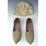 A pair of handmade Indian shoes together with a similar hat