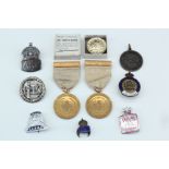 A group of Second World War Home Front and other insignia including a United Alkali Co badge,