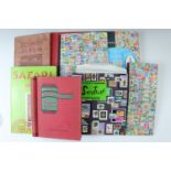 Several juvenile stamp albums containing GB and world stamps, with uncirculated and specimen GB