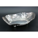 A pierced silver basket, of navette form having four pierced lobes decorated with butterflies,