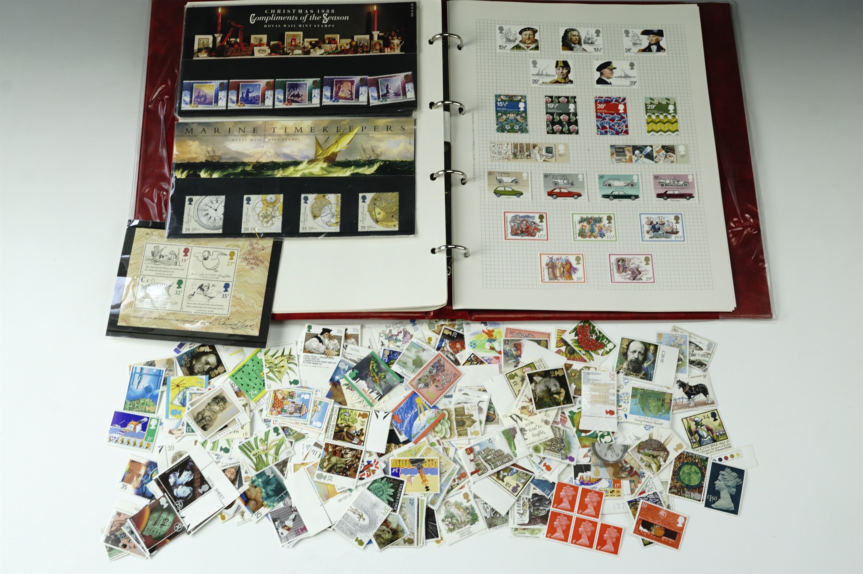 A quantity of unused British decimal stamps, in an album and loose