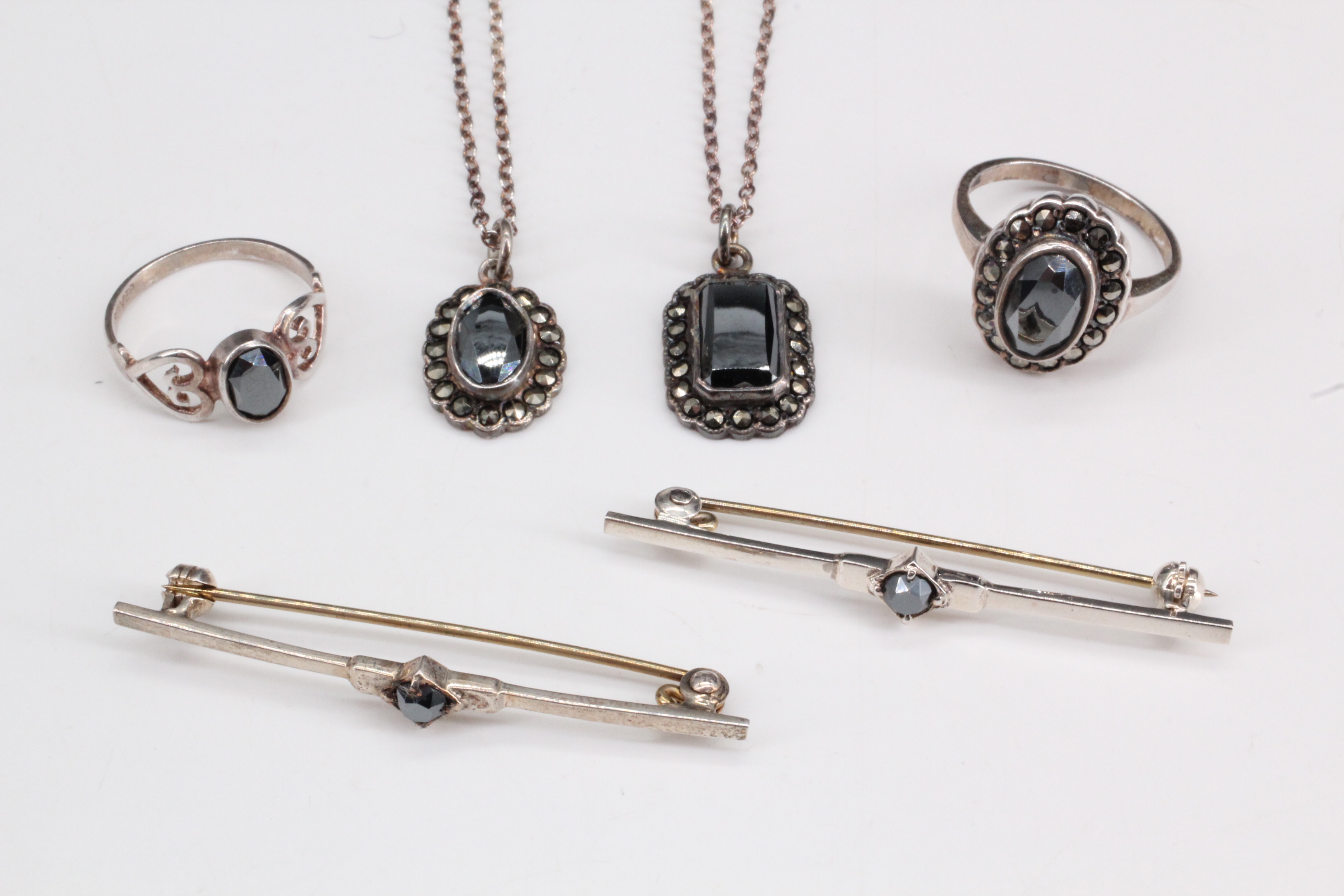 A selection of silver and hematite jewellery, comprising two necklaces with pendants of faceted - Image 2 of 2