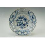 A 20th Century Meissen reticulated onion pattern side plate, 20 cm