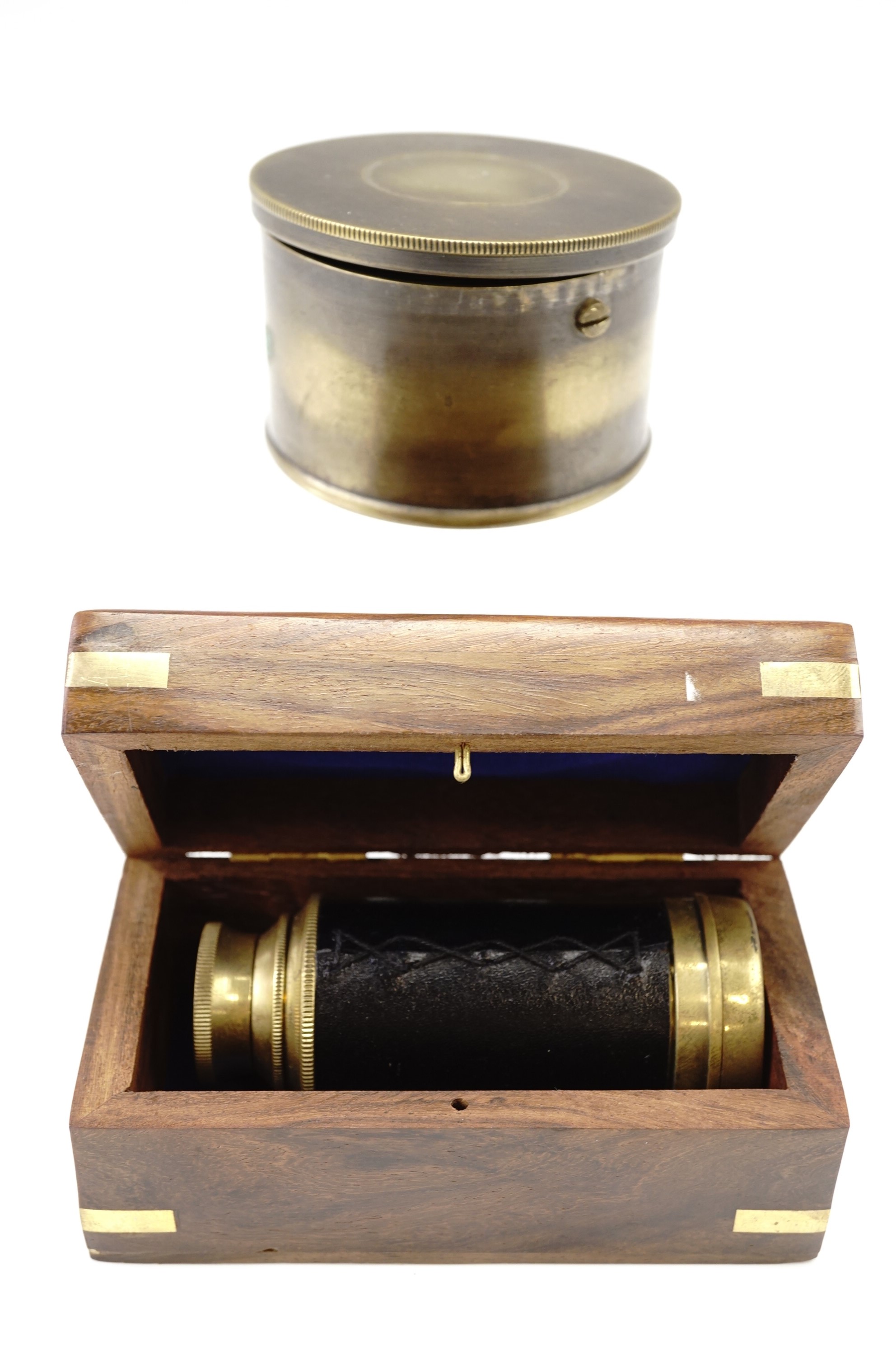 A binnacle mounted compass in a brass case together with a two draw telescope in a brass-inlaid