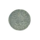 A late 18th Century Ottoman silver 1 Yuzluk / 100 Para coin, bearing the tughra of Selim III, 43 mm