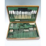 A fine Maple & Co cased canteen of cutlery including carving set