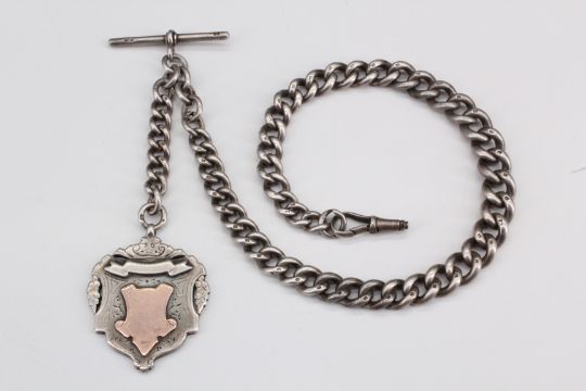 A Victorian silver graduated curb link watch chain, Birmingham, 1897, with a an attached heavy