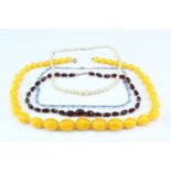 Two vintage faceted glass bead necklaces, a mother-of-pearl necklace and another of amber coloured