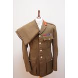 An early 1970s British army major general's service tunic, together with a pair of trousers, the