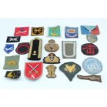Sundry items of world military cloth insignia