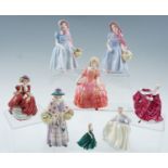 Eight small Royal Doulton figurines