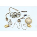 A group of Victorian and early 20th Century gilt metal jewellery including a pendant bauble, a