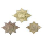 Three Coldstream Guards other ranks' / NCO's pouch / valise badges