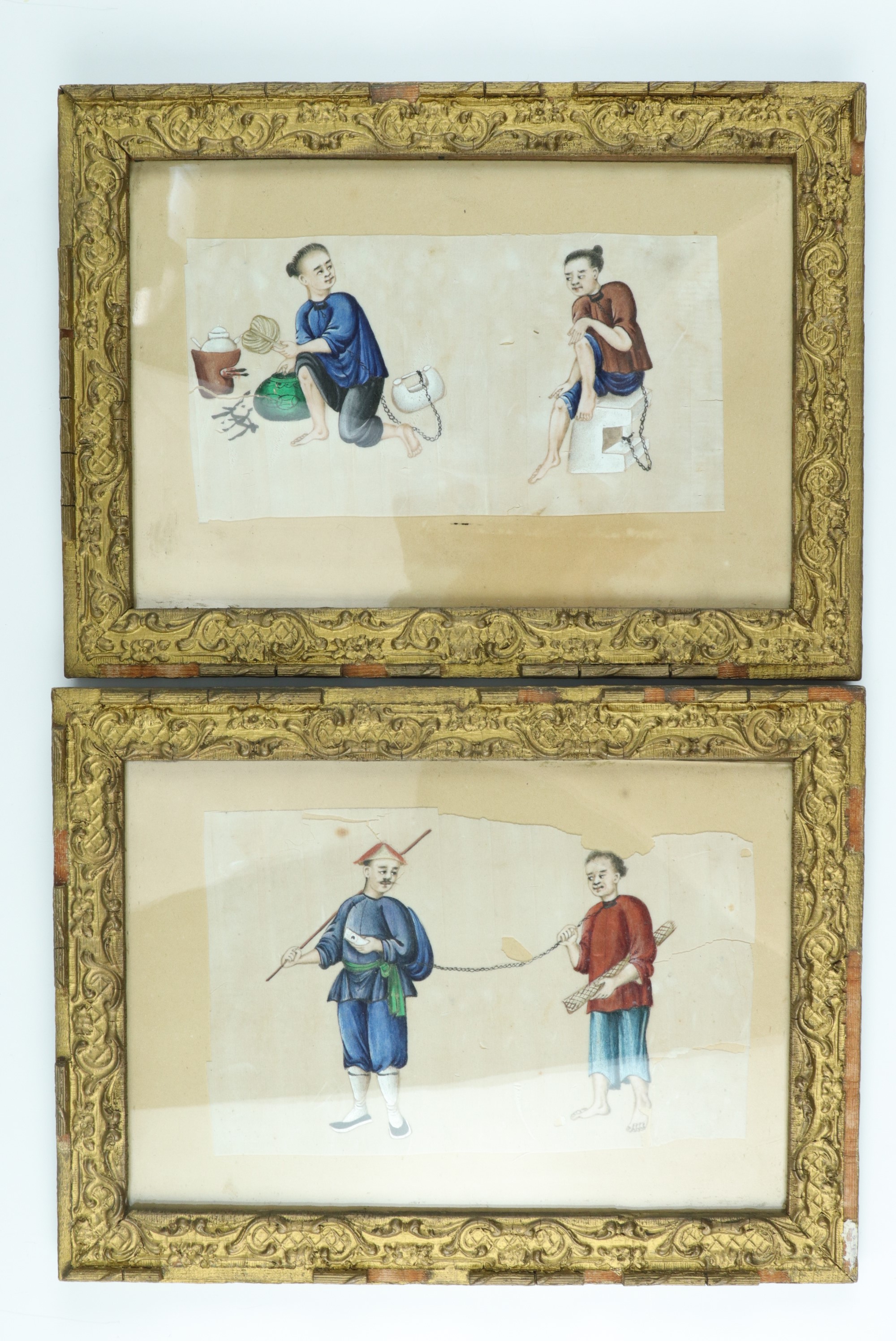 A pair of Chinese watercolour paintings on rice paper of coolies and slaves in chains, in ornate
