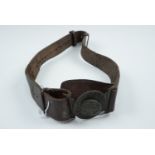 An early 20th Century Boys' Brigade leather belt with brass buckle