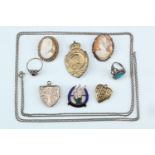 A selection of jewellery, comprising two rings (tested as silver), two gilt metal lockets, an