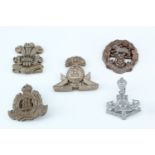 Five Second World War plastic cap badges