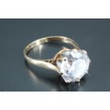 A large solitaire ring, having a white brilliant cut stone of approximately 3.5 carat, basket set