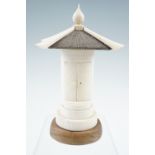 A Japanese carved bone domestic shrine, of architectural form, 20th Century, 17.5 cm (a/f)