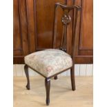A set of four late 19th / early 20th Century mahogany dining chairs