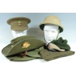 A quantity of late 20th Century world military headgear