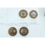 Four various Home Service pattern helmet plate centres