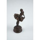 A small bronze sculpture of a ballerina, 8 cm