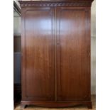 A reproduction Georgian mahogany wardrobe, 130 cm x 64 cm x 188 cm