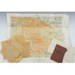 A group of Great War ephemera including a Waterproof Carrier Envelope, a map of Lens, a trench map