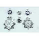 A group of QEII police badges