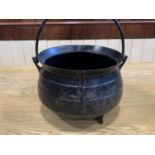 A small cast iron cauldron 32 cm x 24 cm