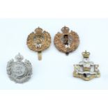 Four Royal Engineers militia, reserve and volunteers cap badges