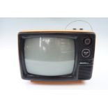 A Sanyo model 12-T232 portable deluxe TV, circa late 1970s - early 1980s