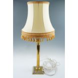 A brass classical columnar table lamp, 57 cm to top of socket, 82 cm overall