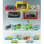 A Corgi Reliant Regal die-cast model van together with ice cream vans etc