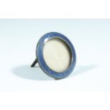 An uncommonly small basse taille enamelled Sterling standard white metal photograph frame,