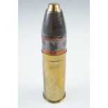 An inert Great War British Vickers 37 mm trench gun round