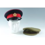 A Duke of Lancaster Regiment dress forage cap together with an earlier officer's Service Dress cap