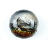 A late Victorian Jersey souvenir glass and printed paperweight