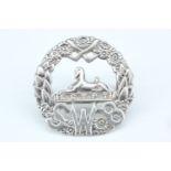 A early 20th Century South Wales Borderers officer's cap badge, (tested as silver), 35 mm