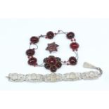 A late 19th / early 20th Century Paris souvenir bracelet together with a Victorian garnet coloured