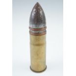 An inert 1918 French 37 mm trench gun round