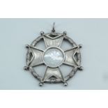 An uncommonly large Victorian white metal prize medallion, in the form of a Maltese cross within a
