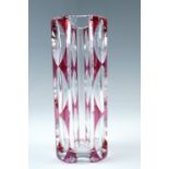 A French Saint-Louis studio glass vase, of perpendicular form, ruby flashed and cut with broad