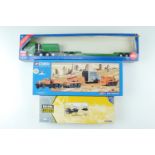 A boxed Corgi Classics US Transport die-cast low loader with generator, a Guy Invincible 8 wheel,