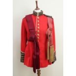 A 1925 dated Grenadier Guards officer's dress frock, trousers and waist sashes, the tunic bearing