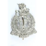 A Volunteer Civil Force "Winston Bobbies" cap badge. [A volunteer constabulary unit formed in 1911