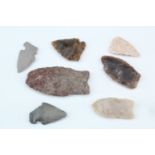 A group of Native American Indian flint / stone arrowheads. [By family tradition collected in the